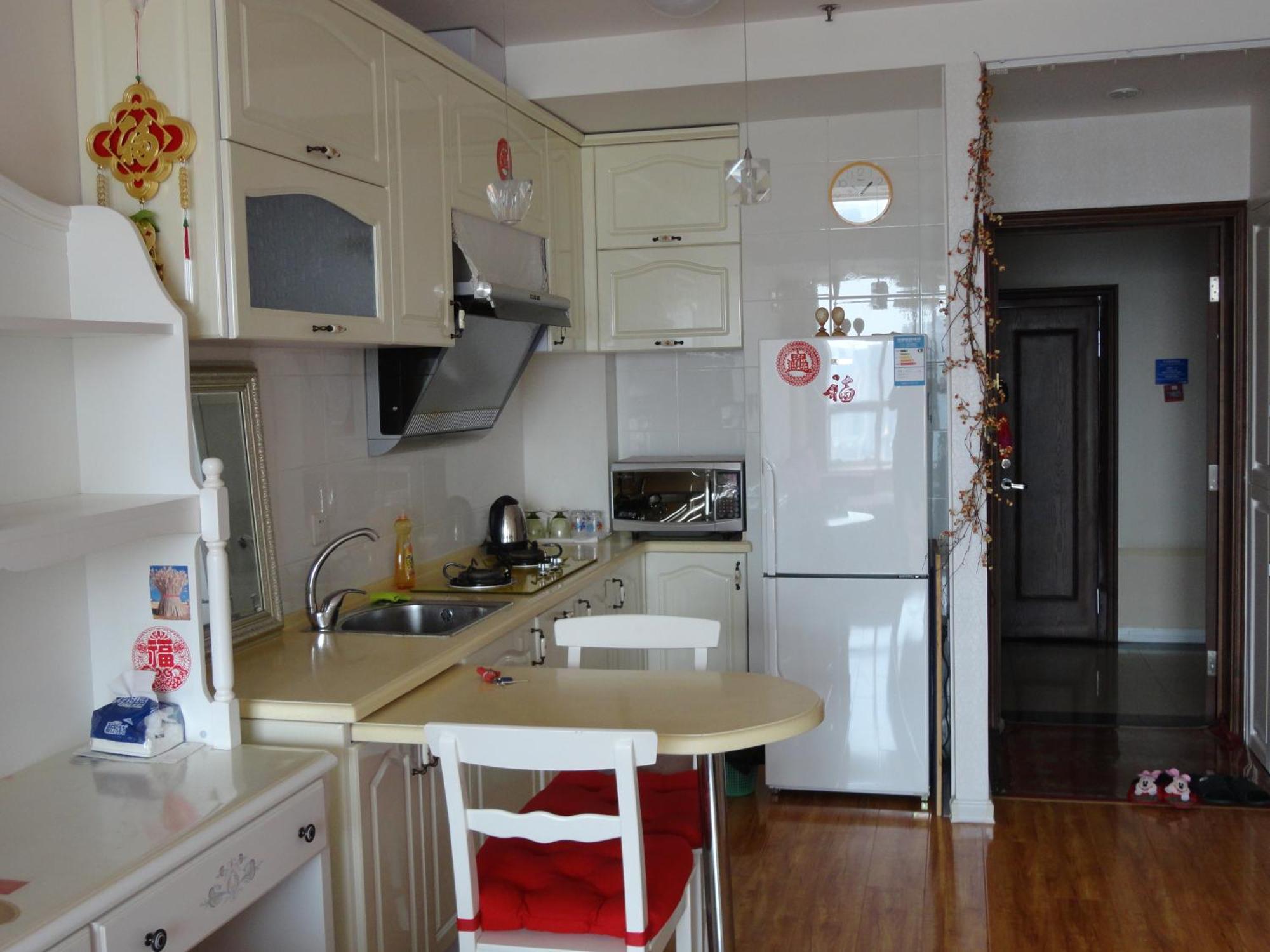 Dalian Xiuzhu Mansion Apartment Rom bilde